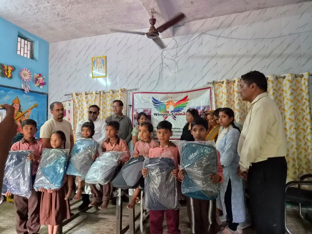 Students receiving Safari school bags at Piprauli school